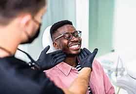 Man smiling in the dental chair