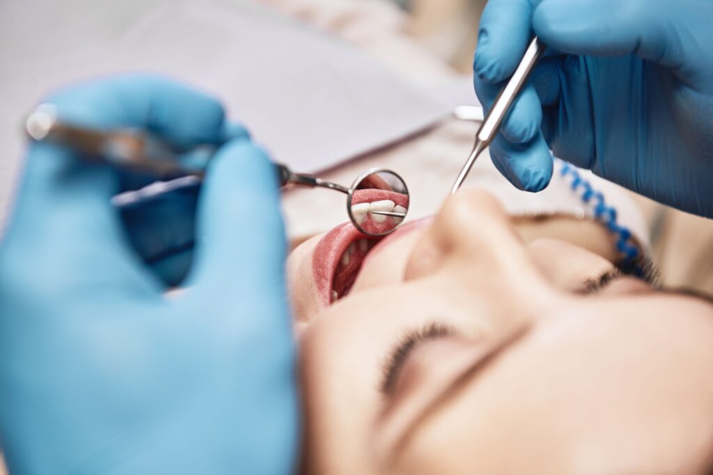 Closeup of woman undergoing dental exam